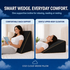 Black memory foam wedge pillow positioned for reclining and relaxing