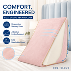 Blush pink wedge pillow providing comfortable back support while reading